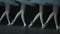 Legs view of young female ballerinas during classical performance in ballet studio spbd.