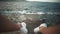 Legs in white sneakers on a rocky beach on the background of sea waves. First person shooting. Focus moves to the