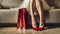 legs of woman in high heeled shoes and shopping bags