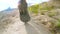 Legs of woman in tourist boots close-up. Hiking