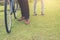 The legs of young couple standing near bicycles in the nature pa