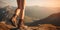 Legs of young female hiker in traveling boot