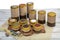 Legume storage containers in various sizes. Tin jars with various types of corn, beans, cereals, for storage and to decorate the