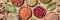 Legumes assortment, overhead panorama on a brown rustic background. Lentils, soybeans, chickpeas, red kidney beans