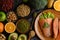 Legumes, fruit and salmon pieces on a wooden plate