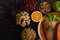 Legumes, fruit and salmon pieces on a wooden plate