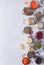 Legumes, seeds and cereals on a gray background. Healthy food. Top view, copy of space