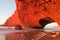 Legzira beach stone arch at sunset light