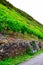 Lehmen, Germany - 10 07 2020: Steep vineyards with rough vineyard wall