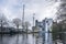 Leiden canal with sailboat and factory