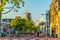 LEIDEN, NETHERLANDS, AUGUST 8, 2018: Sunset view of Beestenmarket and de Valk windmill in Leiden, Netherlands