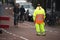 Leiden, Zuid-Holland/The Netherlands - September 29th 2017: a male traffic guard with a bright yellow light reflective suit