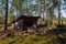 Leikkistenkangas traditional wooden Lean-To shelter and campfire site in Lauhanvuori National Park, Finland