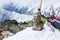 Leinin head statue at the top of Lenin Peak, Pamir Mountains