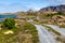 Leka island coastal shoreline with Heilhornet mountain on the horizon under blue clear skies. Trondelag county, Norway summer