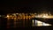 Lekeitio town night view from pier, Spain