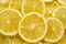 Lemon background. Top view of round slices