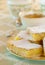 Lemon Bars in an Elegant Table Setting with Tea