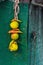 Lemon and chilies tied together with a thread, also known as totka or nazar battu.