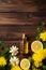 Lemon essential oil in a bottle. Generative AI,