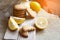 Lemon gingerbread cookies lie on a wooden board on a rustic table, still life of fresh biscuits with citrus, copy space