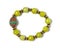 Lemon Green Agate gemstone with ceramic and gold bead bracelet on white background. Collection of natural gemstones accessories.