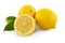 Lemon, half split in half, and two more, on a white background, with leaves, on the sides