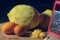 Lemon and kumquats with lemon zests on a wooden table, close up, macro photography