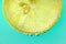 Lemon and line drop in fizzy sparkling water, juice