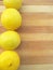 Lemon line on wooden background