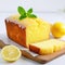 Lemon Loaf Cake on plain white background - product photography