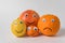 Lemon Mandarin orange grapefruit with funny faces and Googly eyes. Vegetarian family concept