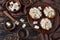 Lemon meringue chocolate tartlets on a table