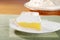 Lemon meringue pie on green placemat