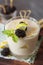 Lemon milkshake garnished with blackberry and mint