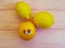 Lemon orange cartoon looking eyes wooden