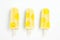 Lemon popsicles on a white background. Cold snack for the hot summer. Generative AI