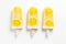 Lemon popsicles on a white background. Cold snack for the hot summer. Generative AI