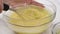 Lemon pudding recipe. Mixing ingredients in a glass bowl