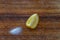 Lemon and salt on a wood surface