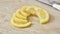 Lemon slices appearing on a countertop