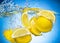 Lemon Slices falling under water with splash