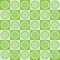 Lemon slices on lime green and light green checkerboard squares seamless pattern.