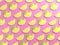 Lemon slices on pink food background