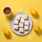 Lemon Squares And Coffee On Yellow Background - Aerial Style Photography