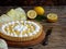 Lemon tart pie with meringue cream. Traditional American cake. Homemade baking. Copy space