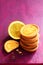 Lemon tartlets on deep pink background