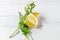 Lemon with vegetables seen from above on wooden background