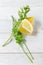 Lemon with vegetables seen from above on wooden background