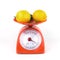 Lemon in weight scale isolated